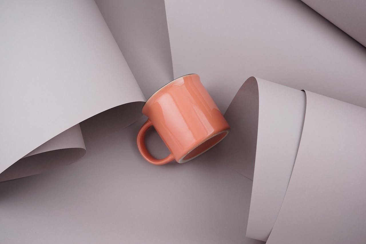 paper and coffee mug